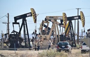 Oil slides as markets weigh peace talk hopes against supply fears